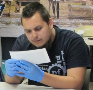 Vladimir looking at one of the historical photographs.